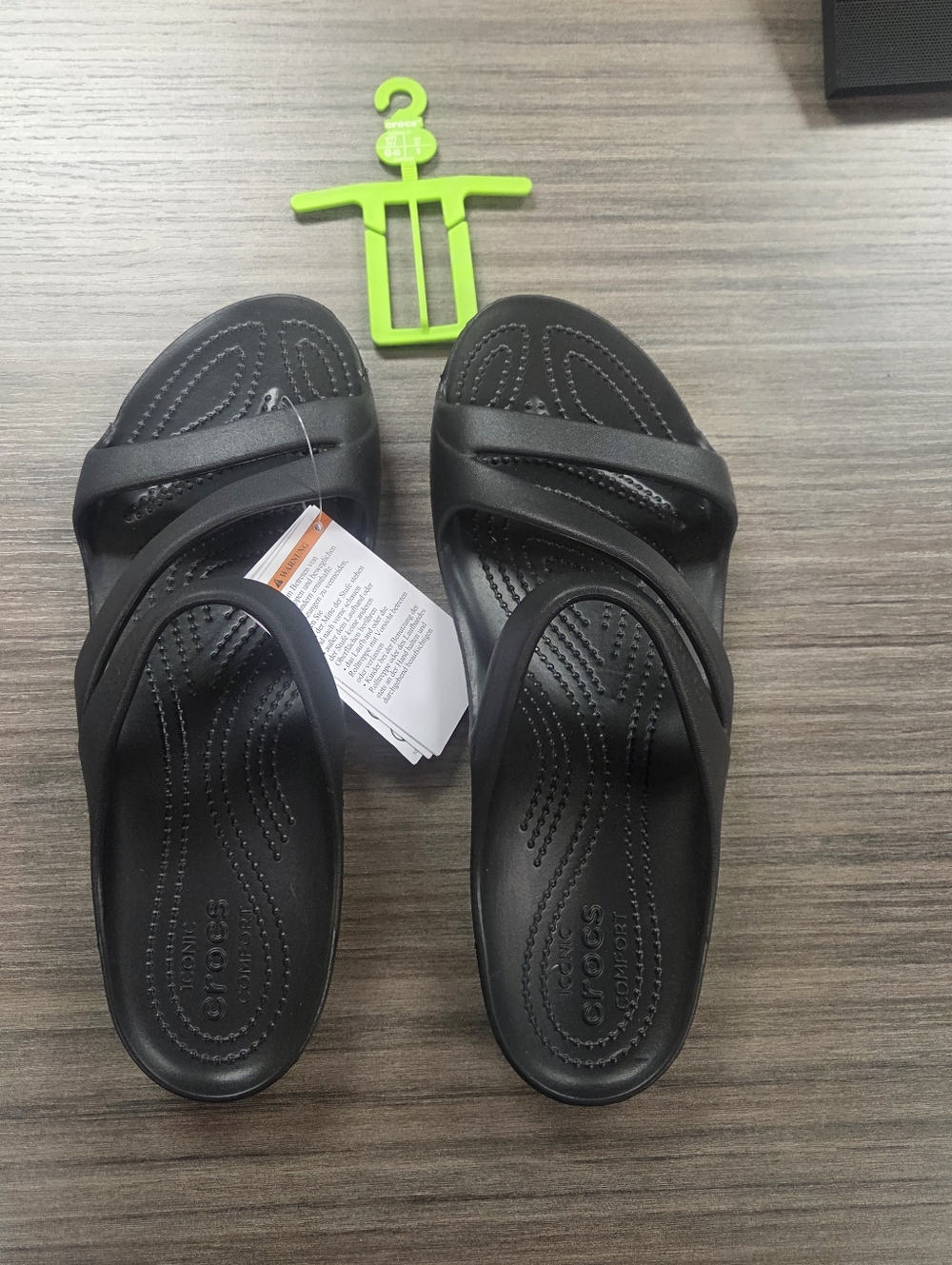 2 pairs of women's size 11 Crocs sandals - 1 new, 1 in great condition